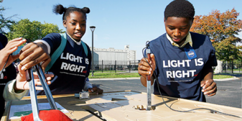 STEM students interacting with technology