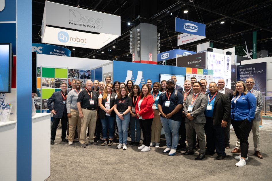 Group photo of Manufacturing USA representatives at the Manufacturing USA Booth at IMTS 2024